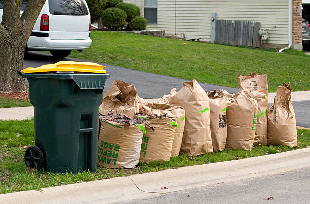 In Suburban Chicago Yard Waste has to be placed in "recycle" bags and special stickers paid in advance need to be placed on them in order for them to be picked up by the disposal service
